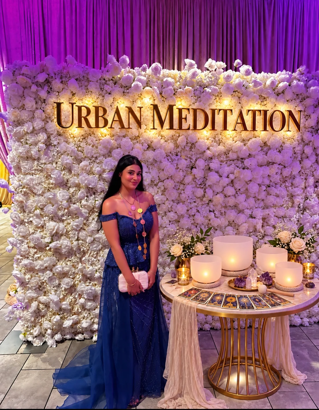 Sylvia Lee beside crystal singing bowls at the Urban Meditation floral backdrop